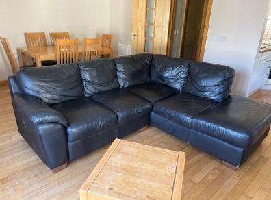 Black leather L shaped couch