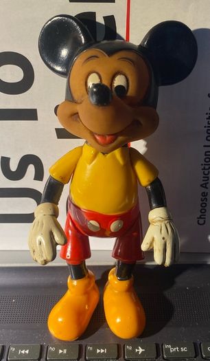 a vintage 1970s Walt Disney Productions hard plastic/vinyl jointed Mickey Mouse figure (made in Hong Kong)