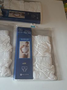 MEN BRIEFS. NEW PANTS. SIZES MEDIUMS are 6 packets and 1 large packet. 2 pants per packet. Total is 14 pant briefs. 2 euros each packet. All for 11 euros.