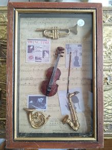 Vintage musically themed key cabinet
