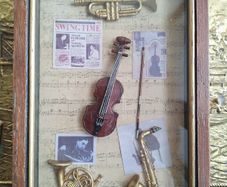 Vintage musically themed key cabinet