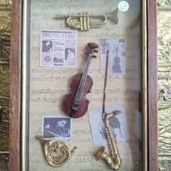 Vintage musically themed key cabinet