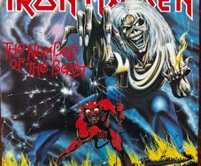 Iron Maiden. Irish release The number of the beast. Outer sleeve is vg+ inner sleeve is vg with some small age marks on 1 side. Vinyl is vg with some light wispy scuff marks and writing on 1 label