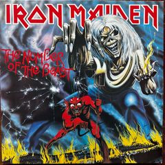 Iron Maiden. Irish release The number of the beast. Outer sleeve is vg+ inner sleeve is vg with some small age marks on 1 side. Vinyl is vg with some light wispy scuff marks and writing on 1 label