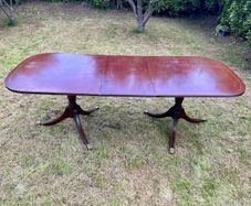 Mahogany extendable dining table