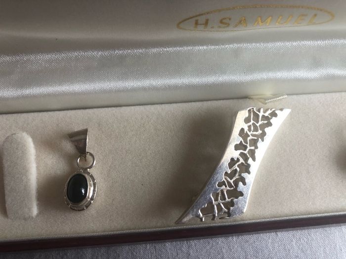 4 silver pendents