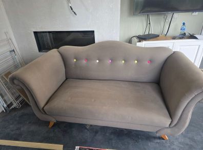 Two matching grey fabric sofas for sale.