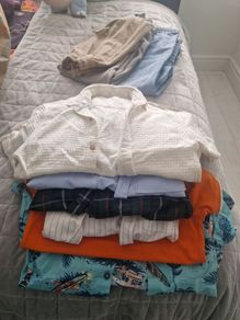 assortment of boys clothes 8 to 9 14 bottoms and 18 tops from Zara, penneys and Next