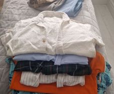 assortment of boys clothes 8 to 9 14 bottoms and 18 tops from Zara, penneys and Next