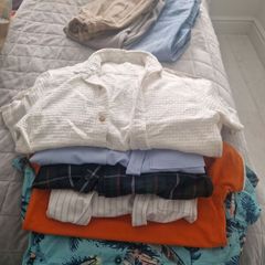 assortment of boys clothes 8 to 9 14 bottoms and 18 tops from Zara, penneys and Next