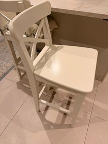 Two wooden bar stools for sale