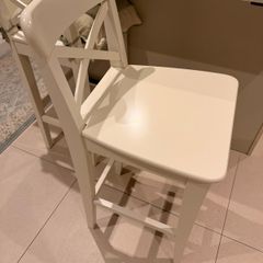 Two wooden bar stools for sale
