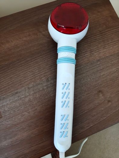 Massage device with heater