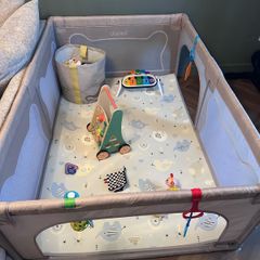 Beige playpen (barely used)