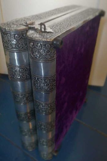 Book-shaped silver jewellery box with purple velvet lining