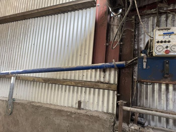 Dairymaster Scraper