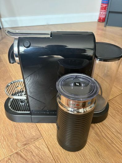 Nespresso coffee machine including milk frother