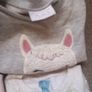 selection of girls jumpers Image 8