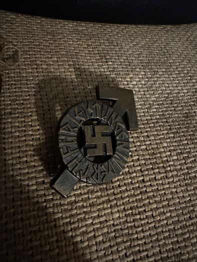 WW2 German documents with an eagle pin and an identification tag for one soldier