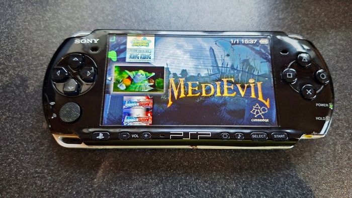 Modded Black PSP Slim 3000 128GB with games