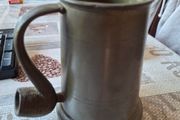 Vintage Pewter Tankard featuring a distinctive Pipe-Shaped Handle, British or Dutch, often dated from the 18th to 20th centuries