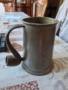 Vintage Pewter Tankard featuring a distinctive Pipe-Shaped Handle, British or Dutch, often dated from the 18th to 20th centuries