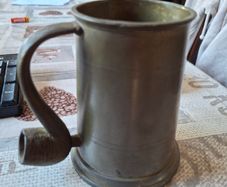 Vintage Pewter Tankard featuring a distinctive Pipe-Shaped Handle, British or Dutch, often dated from the 18th to 20th centuries