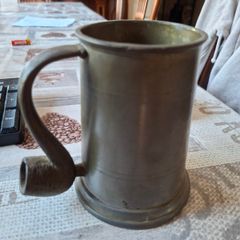 Vintage Pewter Tankard featuring a distinctive Pipe-Shaped Handle, British or Dutch, often dated from the 18th to 20th centuries