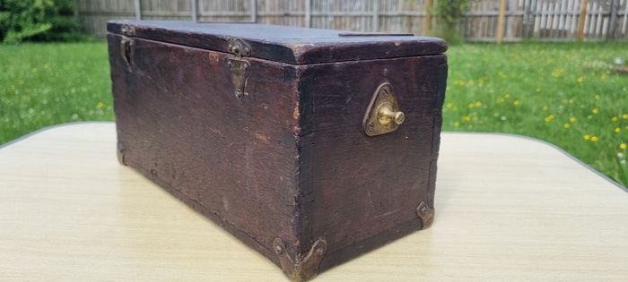 Old wooden box with brass fittings