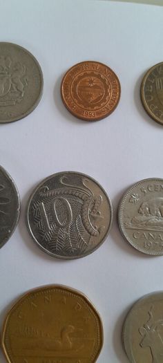 Coins a mix of different countries 28 coins in total registered post included