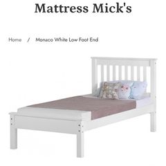 White wooden single bed low foot end