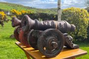 vintage large carved wooden cannons