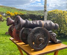 vintage large carved wooden cannons