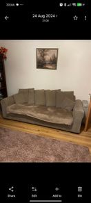 Brown three seater sofa