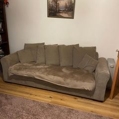Brown three seater sofa