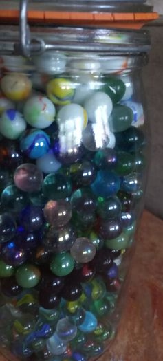 Antique collection of old marbles in large clip sealed jar it's full to the top loft find from very old house in France Beautiful