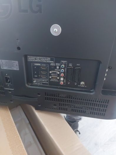 32 inch LG TV with remote and stand in box