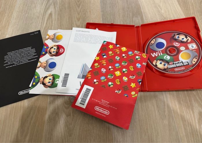 Wii games bundle - Mario bros Wii, Smash Bros Brawl, and Sonic Riders