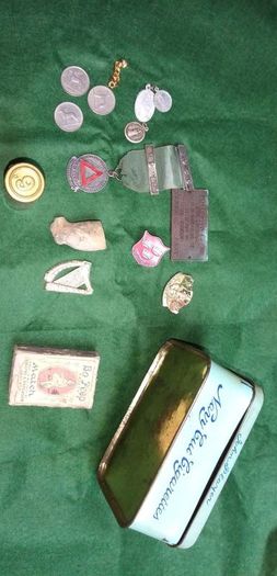 old tin and contents