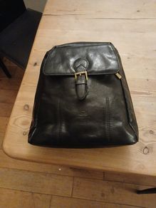 Leather knapsack.