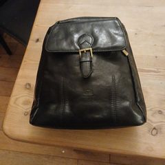 Leather knapsack.