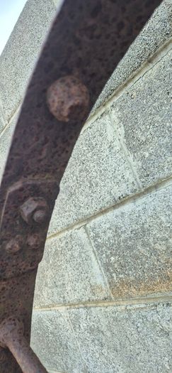 old wrought iron wheel.