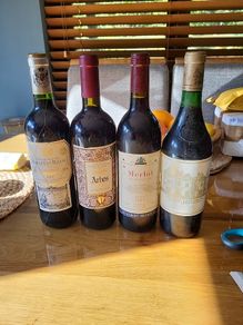 Full unopened wine bottles for display