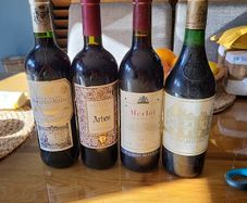 Full unopened wine bottles for display