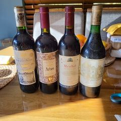 Full unopened wine bottles for display