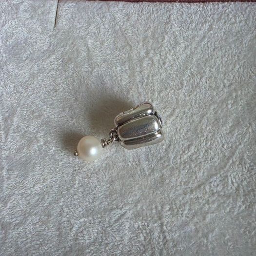 Pandora  charm with pearl drop and purple gemstone in great condition