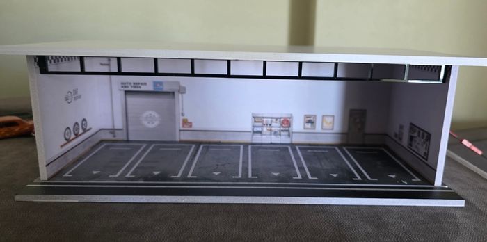 Garage for 1:64 scale toy cars, for Hot Wheels and similar models, with lights.