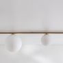 Modern Brass & Frosted Glass Globe Linear Ceiling Light Image 5