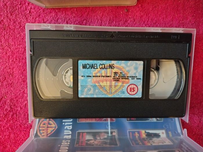 Videos "Michael Collins" and "The Quiet Man".  Near mint condition