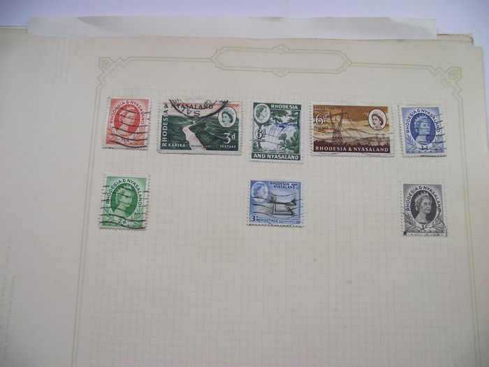 A collection of stamps from Northern Rhodesia, Southern Rhodesia, Rhodesia, South Africa and Nyasaland on loose pages
